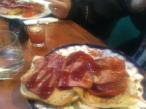  Vegan eggs, bacon and tomato on toast at Good Golly Miss Polly in Burra