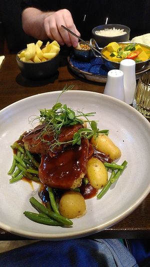 The vegan nut roast at fore, chefs own tofu curry at rear at The White Horse in Saintfield