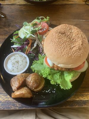 Tempeh burger with salad and potato/veganaise  at Blossom Cafe in Pai