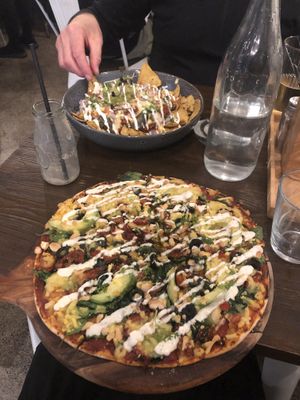 Cashewcado pizza (front) and nachos (back) at Gorilla Kitchen in Auckland