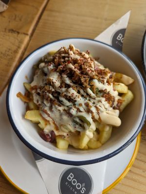 Dirty fries (chips, cheese or vegan cheese, fried onion, jalapeños, beans, sauce) at Boo's Kitchen in Mumbles