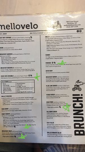 Sunday brunch menu with highlighted vegan items at Mello Velo Cafe in Syracuse