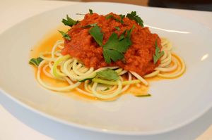 Zucchini pasta with tomato sauce! at Roots Cafe in Cascais