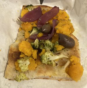 Pizza with broccoli, pumpkin, red onion, olives   at Pane e Tempesta in Rome