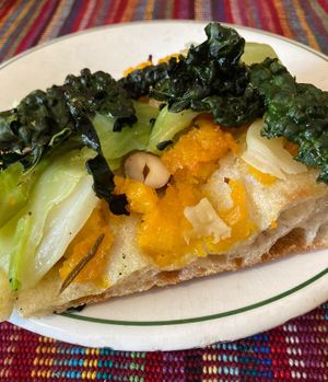Pizza with pumpkin, cabbage, black cabbage, hazelnuts  at Pane e Tempesta in Rome