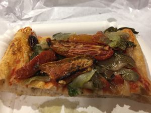 escarole, capers, olives, semi-dried home made tomatoes pizza at Pane e Tempesta in Rome