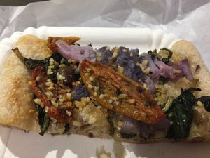 chicory, violet cauliflower, semi-dried home made tomatoes, toasted hazelnuts pizza at Pane e Tempesta in Rome