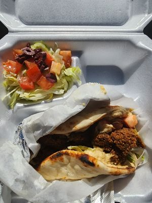 Falafel pita wrap and a side Greek salad (cheese removed from salad) at Jafar's Mediterranean Grill in Van Alstyne