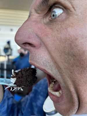 Hubby making a bigger face than needed for a bite of the delicious quinoa brownie.   at YWG - Green Carrot Juice Company in Winnipeg
