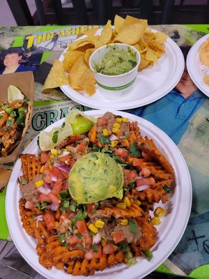 Sweet potato nachos and chips & guac at Rad Dads Tacos and Tequila Bar in Muskegon