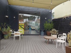 Outdoor patio at Vegan Popup By XMarket in Venice