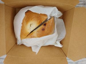 Plain bagel toasted with vegan cream cheese at Vegan Popup By XMarket in Venice