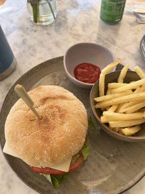 Vegetarian burger, fries, and fried halloumi (not pictured)  at The Skinny Kitchen - Marina in Ibiza