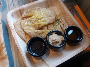 flat bread with hummus, garlic and chilli oil at Garden of Vegan in Ranelagh