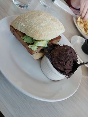 balsamic tofu sammy (added avo) and a side of black beans at Beans and Barley Market & Cafe in Milwaukee