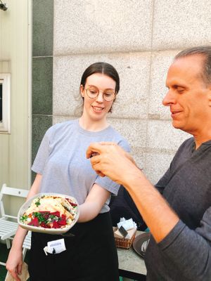 Eric Brent, the CEO of HappyCow is taking a photo of Southside parlors vegan taco at the HappyCow Seoul meet up at Southside Parlor in Seoul