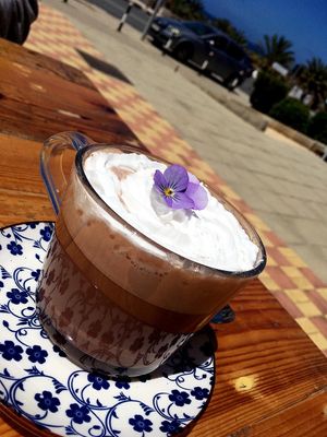 Hot chocolate with vegan squirty cream at Meraki Market Cafe in Paphos
