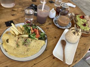 Omelette (left) oats (centre) avo toast (right)  at Meraki Market Cafe in Paphos