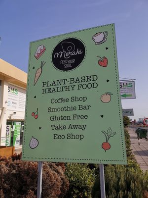 Road sign at Meraki Market Cafe in Paphos