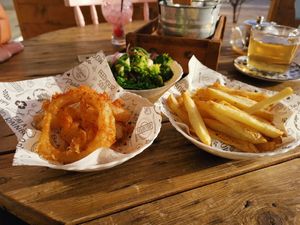 Sides: onion rings in paprika salt / broccoli, kale sautéed & green beans in garlic & onion / sea salt fries at Meraki Market Cafe in Paphos