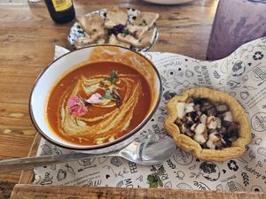 Tomato soup with mushroom onion cheese tart, side of tofu at Meraki Market Cafe in Paphos