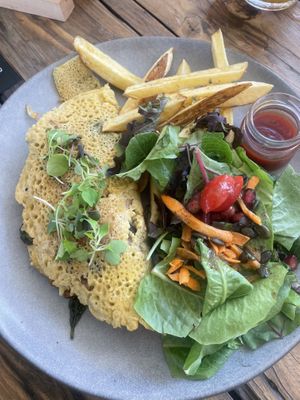 Chickpea omelette with veggies and cheese and fries   at Meraki Market Cafe in Paphos