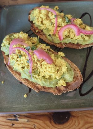 Smashed avocado toast with scrambled tofu at Meraki Market Cafe in Paphos