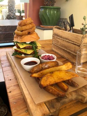 The Meraki burger with potat wedges. So good! at Meraki Market Cafe in Paphos