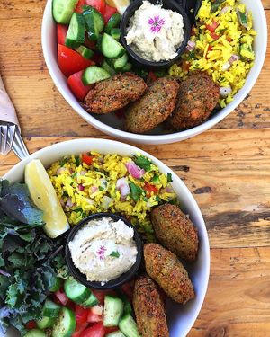 Falafel Buddha Bowl: falafel, kale, turmeric tabbouleh (rice, quinoa, parsley, mint, lemon, onion, turmeric peppers, cucumber and tomato). Served with Meraki hummus. Perfect! at Meraki Market Cafe in Paphos