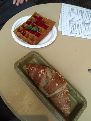 Apple waffle with raspberry syrup and a croissant🥐 at Gelarto Bistro in Budapest