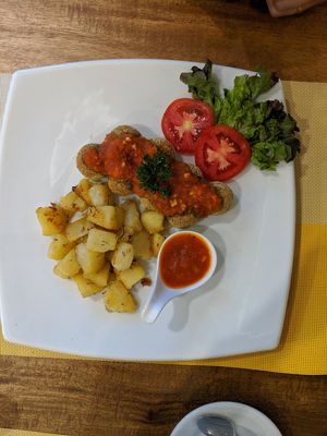 Lentil quinoa meatless balls with marinara sauce served with roast potatoes at Buon Gusto in Phuket