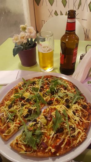 So-so pizza with vegan cheese at Point Cafe in Mykonos