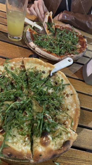 Verde pizza & pugliese (in the back) both vegan  at Little Wing Pizzeria in Belfast
