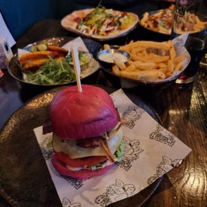 Gouda god burger with Dill fries and Corn Ribs in the background at Church - Temple of Fun in Sheffield