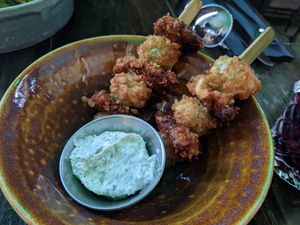 Fried olives and sun-dried tomatoes on sticks at Church - Temple of Fun in Sheffield