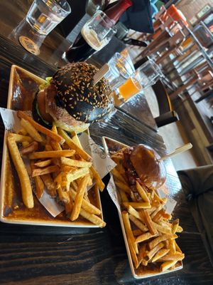 Saturday 6 April 2024 visit - on the left the Syko Burger and on the right, an item from this month's Specials menu. We hadn't read it as being a burger so it was a surprise! at Church - Temple of Fun in Sheffield