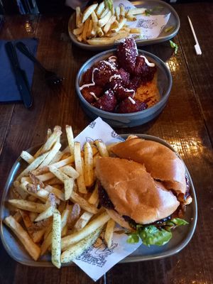Chicken and bacon burger with a side of cauliflower wings at Church - Temple of Fun in Sheffield