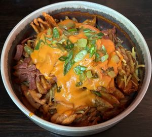 Bacon Gouda loaded waffle fries. at Church - Temple of Fun in Sheffield