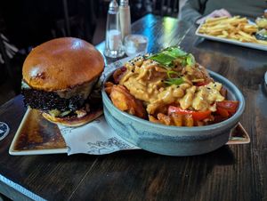 Pickle rib burger and satay away fries at Church - Temple of Fun in Sheffield