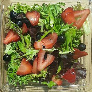 Fresh Berry Side Salad - NO Feta - strawberries, blueberries, & mixed greens, tossed w/ a seasonal housemade bright & complex lemony extra virgin olive oil balsamic dressing at Blaze Pizza in Lincoln