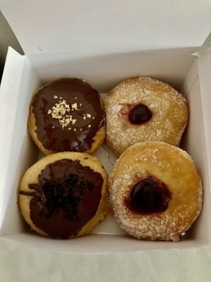 Vega mini donuts. Oreo, No-tella, Raspberry and Blueberry .  at Happy Donuts in West London
