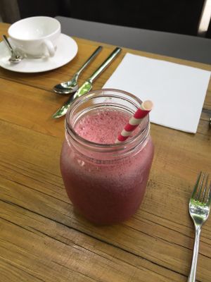 Berry smoothie with paper straw   at Cafe Forty One in West London