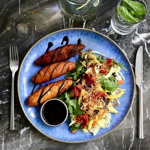 ALPINE RAVIOLES WITH FRESH SLAW, SUNDRIED TOMATOES AND SMOKY GLAZE at Cafe Forty One in West London