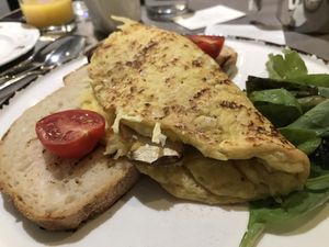 Vegan chickpea omelette with vegan cheese and mushrooms  at Cafe Forty One in West London