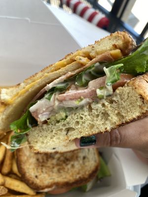 Tasty Club Sandwich 🥪 Messy But GOOD! 😋  at TNK Vegan Cafe in Modesto