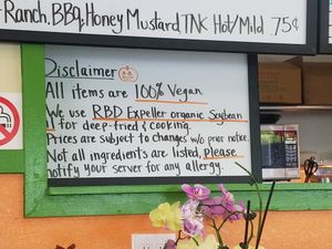 Disclaimer at TNK Vegan Cafe in Modesto
