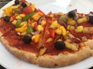 Pizza with vegan cheese at The Lakeside Brasserie in Cirencester