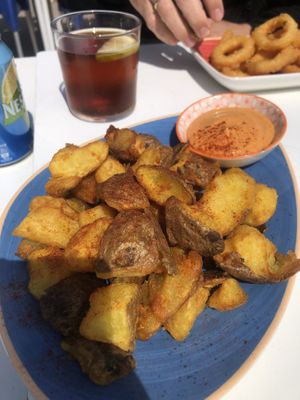 Patatas bravad with sriracha Mayo   at Takuara in Badalona