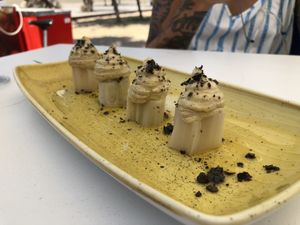Leeks with hummus and edible ash.  at Takuara in Badalona