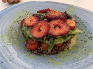 Quinoa salad with strawberries, avocado, seeds and a mango sauce.  at Takuara in Badalona